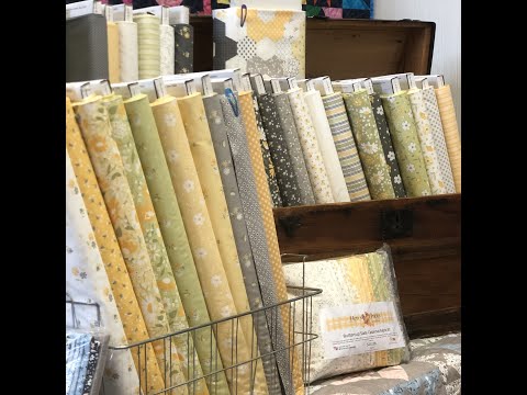 Fabric featuring buttercup and slate designs