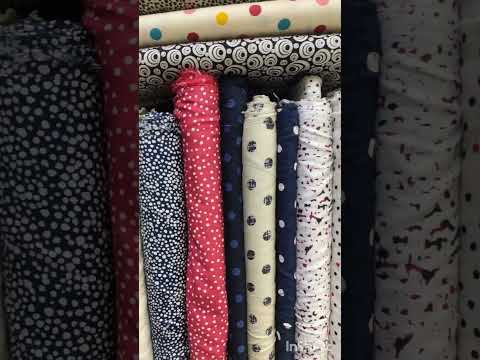 Fabric with red and white polka dot pattern