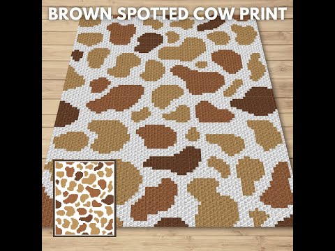 Fabric with a print of brown cow pattern